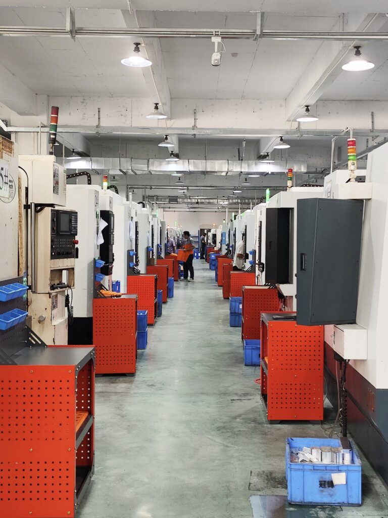The factory environment of Keywin in the mechanical machining industry, featuring modern equipment, organized workstations, and a professional workforce for high - quality production.