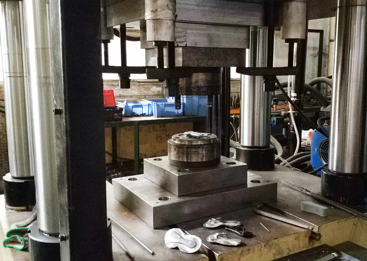 Precision forging services in a mechanical processing plant. Skilled workers are operating advanced forging equipment to create high - precision metal parts for various industries.