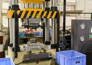 Precision custom metal forging services in a mechanical processing plant. Skilled workers are operating advanced forging equipment to create high - precision metal parts for various industries.
