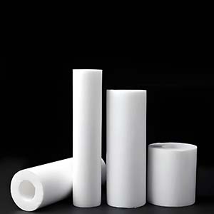 PTFE (Teflon) being processed in the mechanical machining industry, including operations like cutting and boring.