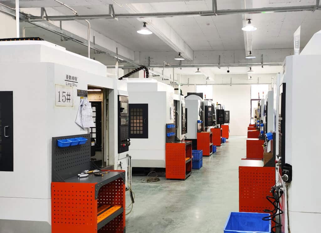 CNC machining equipment cutting aluminum alloy parts with high accuracy in a mechanical processing factory