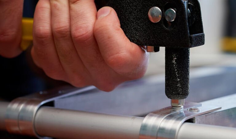 What is a Rivet? Close-up view of industrial solid rivet fastener, a key mechanical machining component for metal assembly and structural connection in machinery manufacturing.