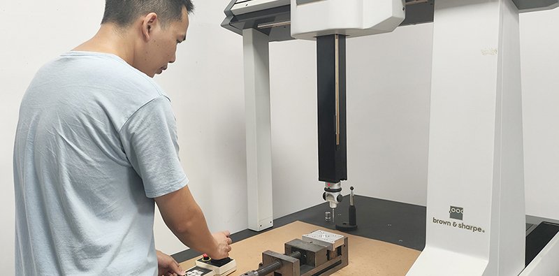 Final inspection and delivery for precision CNC machining parts, quality checking finished mechanical components before shipment in machine‑shop.