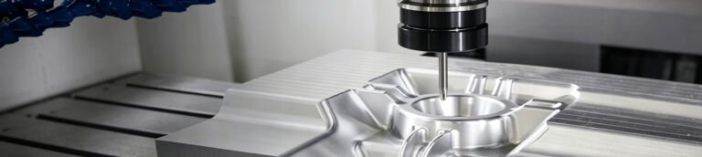Titanium vs Aluminum machined metal parts display, precision CNC machined alloy components for aerospace and mechanical manufacturing