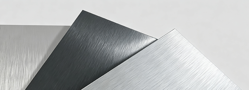 Precision CNC machined workpiece with brushed aluminum surface finish, fine linear grain texture for mechanical industry custom metal components.