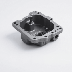 Gravity die-casting process forming automotive transmission housing with precise dimensions and uniform structure