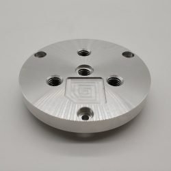 Aluminum alloy (6061 or 7075) audio top cover manufactured through CNC turning and milling, featuring precision-milled surfaces and natural anodization, designed for consumer electronics applications.