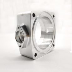 An automobile body being precisely machined in a mechanical processing workshop. The high - precision tools are carefully shaping the body, showing the advanced technology of the mechanical processing industry.