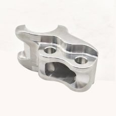 A front link component for bicycles in the mechanical processing industry, showing high - precision machining details.