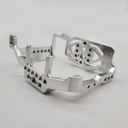 Camera bracket crafted from 6061-T6 aluminum alloy through 5-axis CNC milling, drilling, and tapping, available in untreated or anodized (silver/natural) finish for consumer electronics applications.