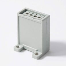 Precision-machined connector housings for electronic devices, showcasing accurate dimensions and smooth surfaces