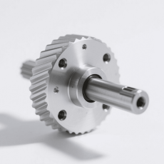 Manufacturing of conveyor wheel axles for harvesting equipment in a mechanical processing plant. Skilled technicians are using specialized tools to craft high - quality axles that ensure smooth operation of harvesting machinery.