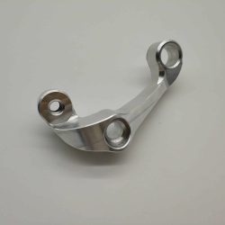 Automotive-grade motorcycle handlebar clamp fabricated by 5-axis CNC milling, integrated with tapping and drilling, made from 7075 aluminum alloy, finished with precision milling and natural anodization.