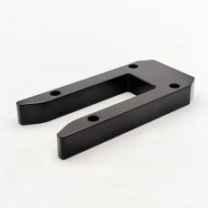 Marine sailboat body manufactured by CNC machining, crafted from black POM material with as-machined finish, ideal for maritime applications.