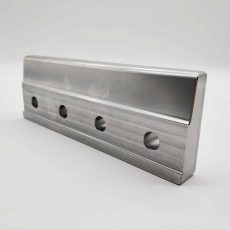 Marine sailboat slider manufactured by CNC milling, drilling & counterboring, and local grinding, made from tool steel (Cr12, SKD11), high-strength carbon steel (45#), or tool steel (D2), finished with heat treatment, precision grinding, oil-based anti-rust coating, and slight passivation.