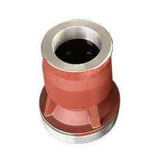 Industrial scene showing bearing components after sand casting undergoing precision grinding in a mechanical processing workshop